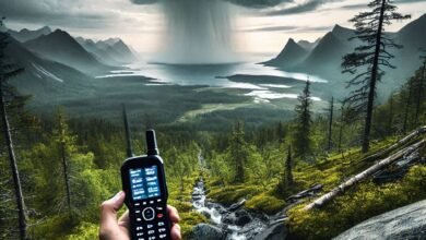 satellite phone being used in the wilderness for review and testing by outdoor tech lab